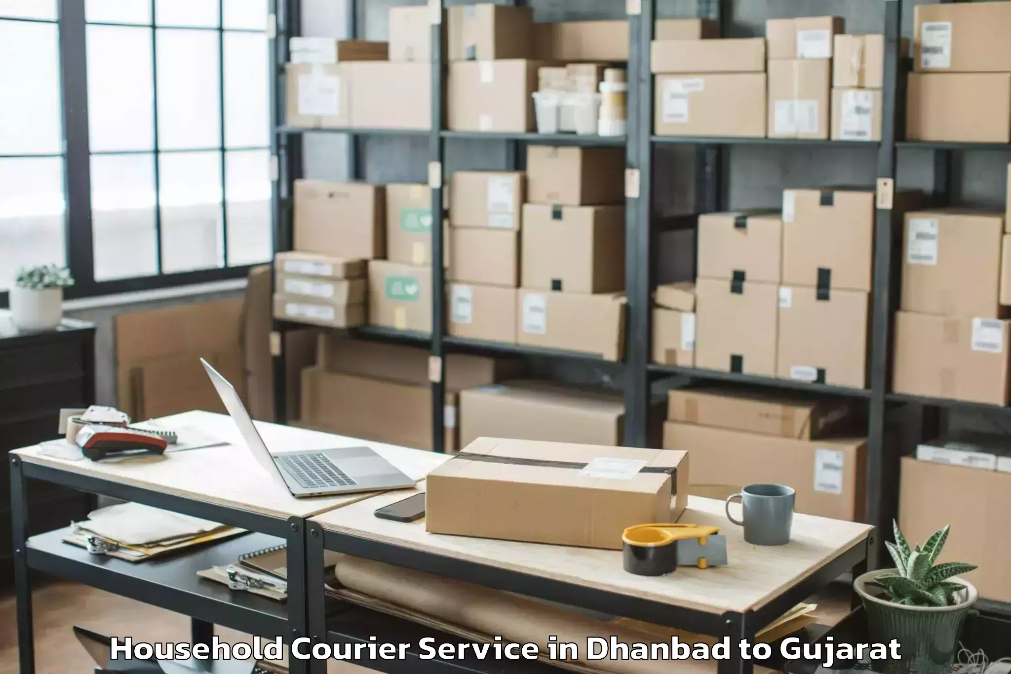 Get Dhanbad to Khedbrahma Household Courier